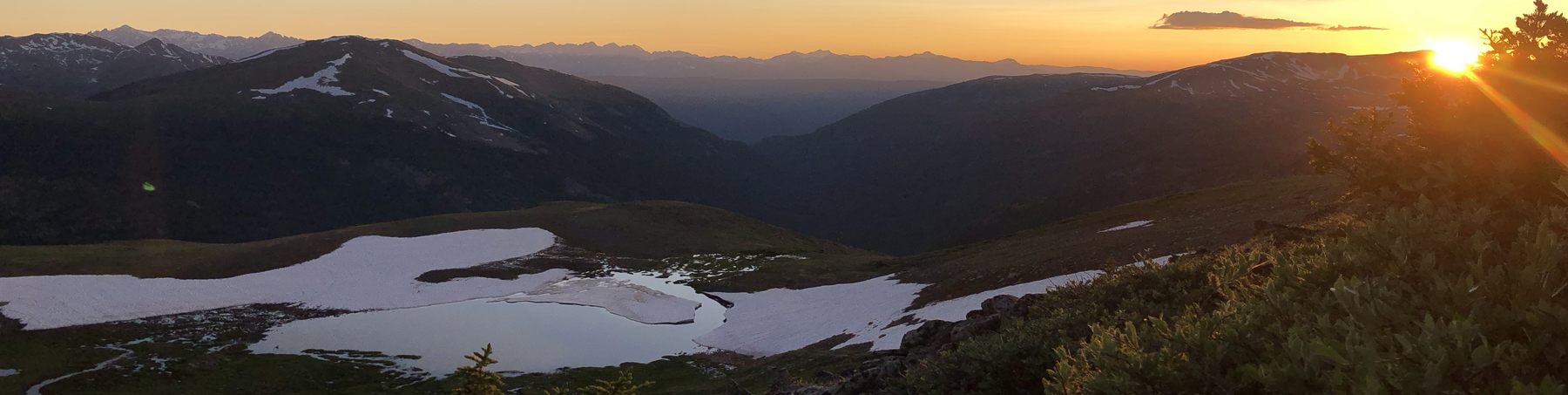 The sun sets on high alpine lakes in the mountains along the Continental Divide