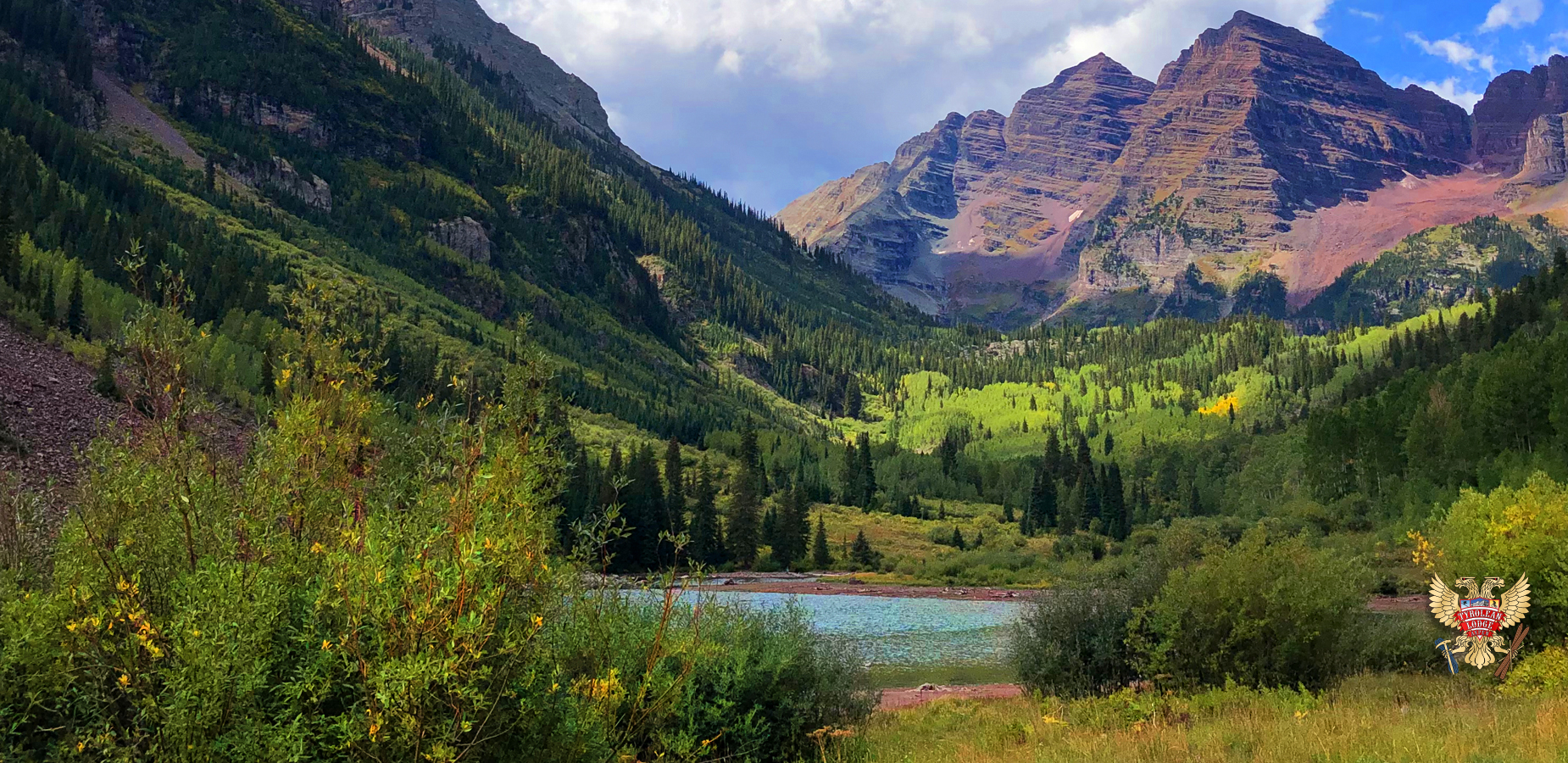 Green turns to yellow early fall at the Maroon Bells